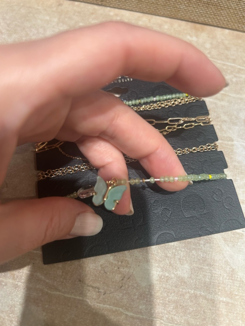 Guess Gold & Mint Butterfly Layered Bracelet Set - Picture 4 of 5